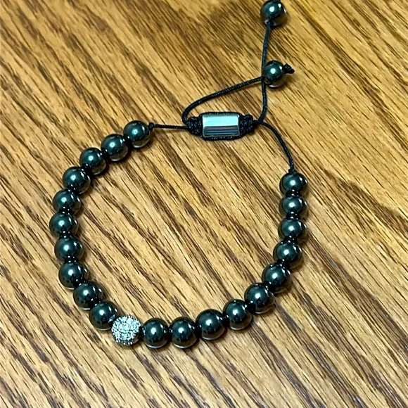 Hematite bracelet with pave crystal bead. NWOT. Comes in box. - Picture 2 of 4